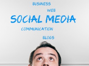 man ponders social media