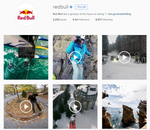 A screenshot of Red Bull's Instagram page, featuring a grid of photographs and video thumbnails of people sailing, rock-climbing, snowboarding and taking part in other extreme sports.