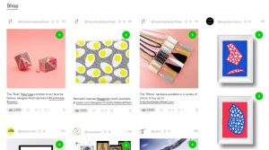 A screenshot of Ello's curated 'shop' category, showing a grid layout of different art prints, necklaces and framed artwork, all for sale with a green dollar icon in the top right corner.